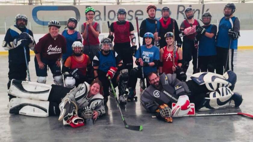 team of roller hockey players on the concrete