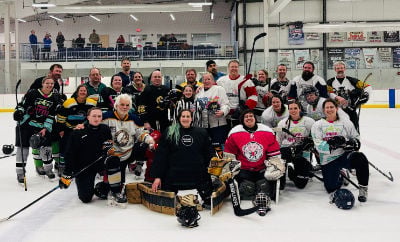 Adult hockey league game in progress